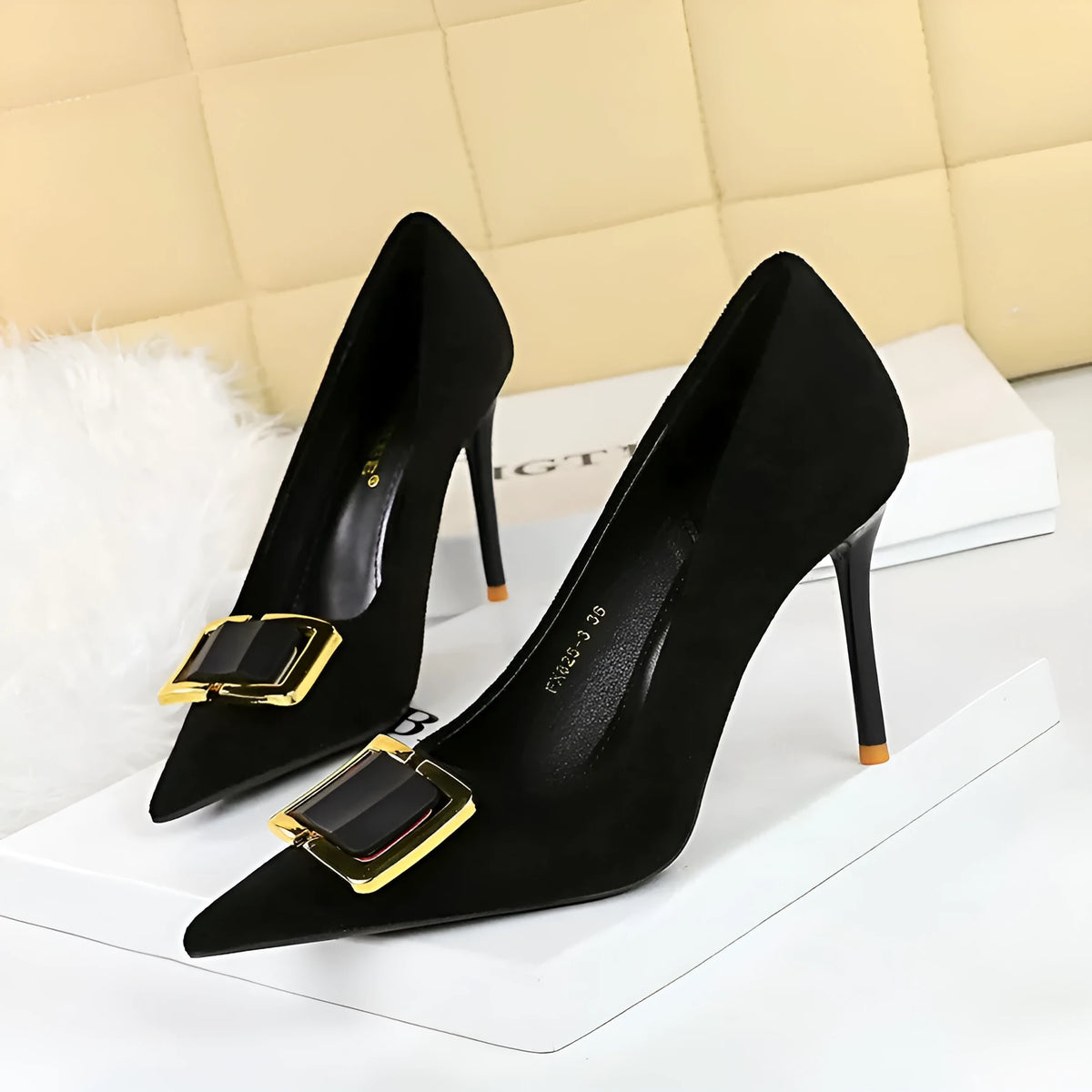 Black suede women's high heel shoes with a tall stiletto heel and tapered toe.
