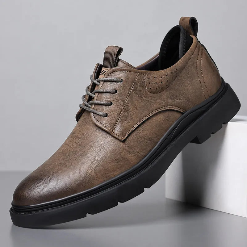 Men's black and brown leather casual shoes with a cowhide upper and rubber sole.