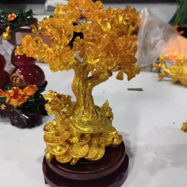 Citrine coloured resin Feng Shui money tree ornament with small water turtle design in Chinese style