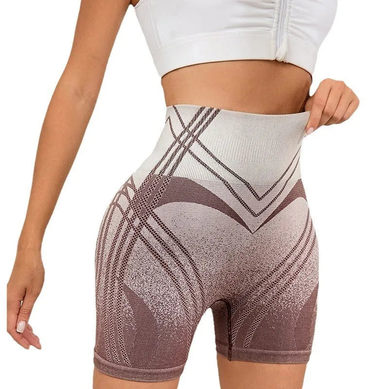 Women's high-waisted gradient fitness shorts in black or brown with Monsters Inc design for yoga and running