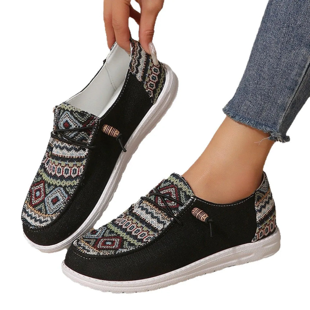 Women's flat round toe low-top shoe in artificial PU, available in black, dark grey, and khaki.