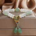 Green Tian Shan Cui abacus beads jade bracelet with butterfly tassel and pearl accents