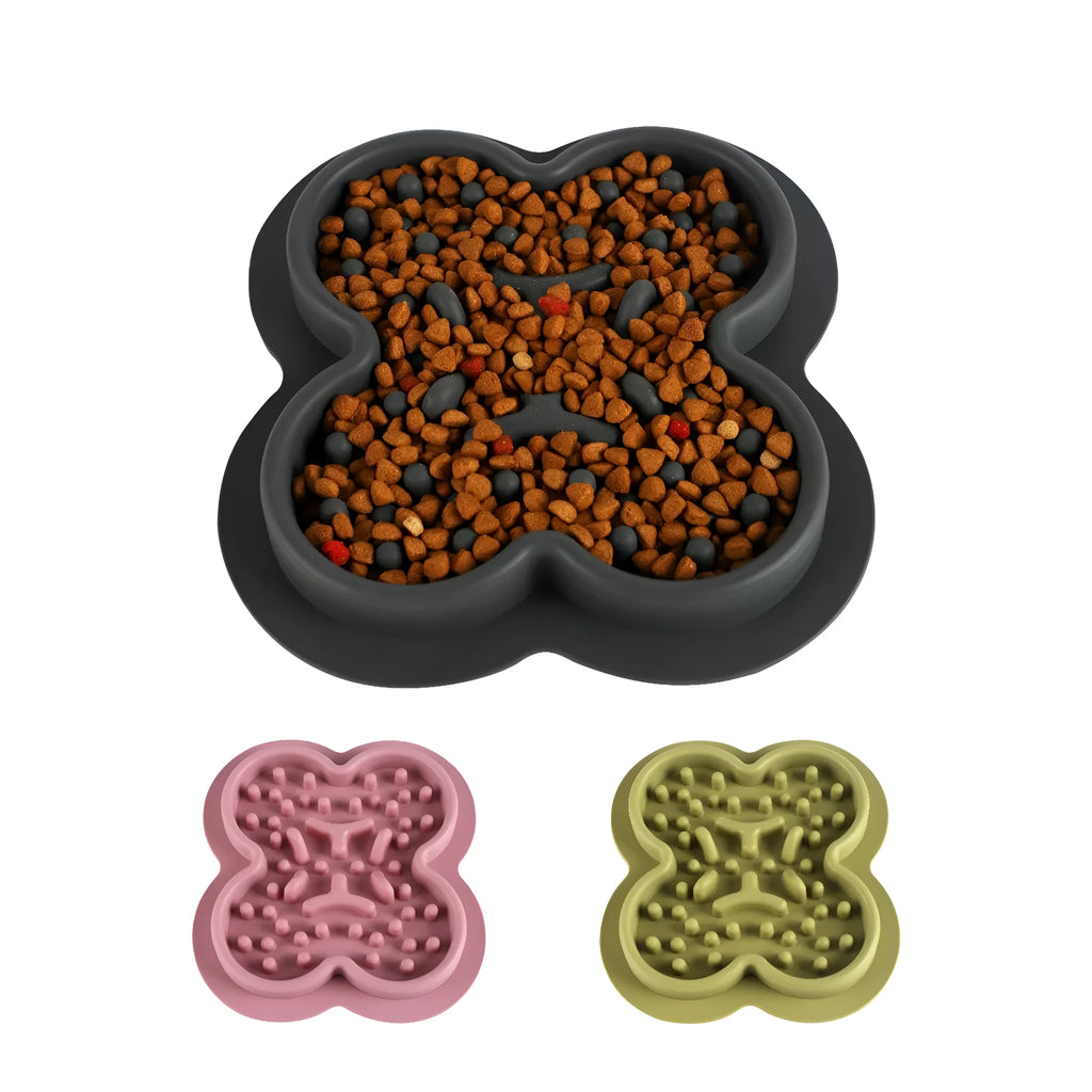 Silicone pet licking pad slow feeder mat in blue on a kitchen floor