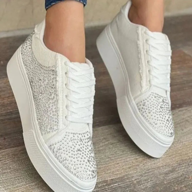 Plus size women's black lace-up casual shoes with rhinestones on the side and a thick rubber sole.