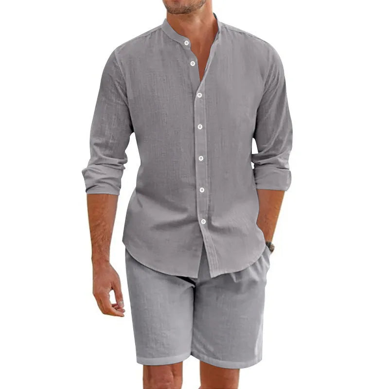 Men's dark grey hemp blend linen summer suit with short sleeve button-down shirt and drawstring shorts.