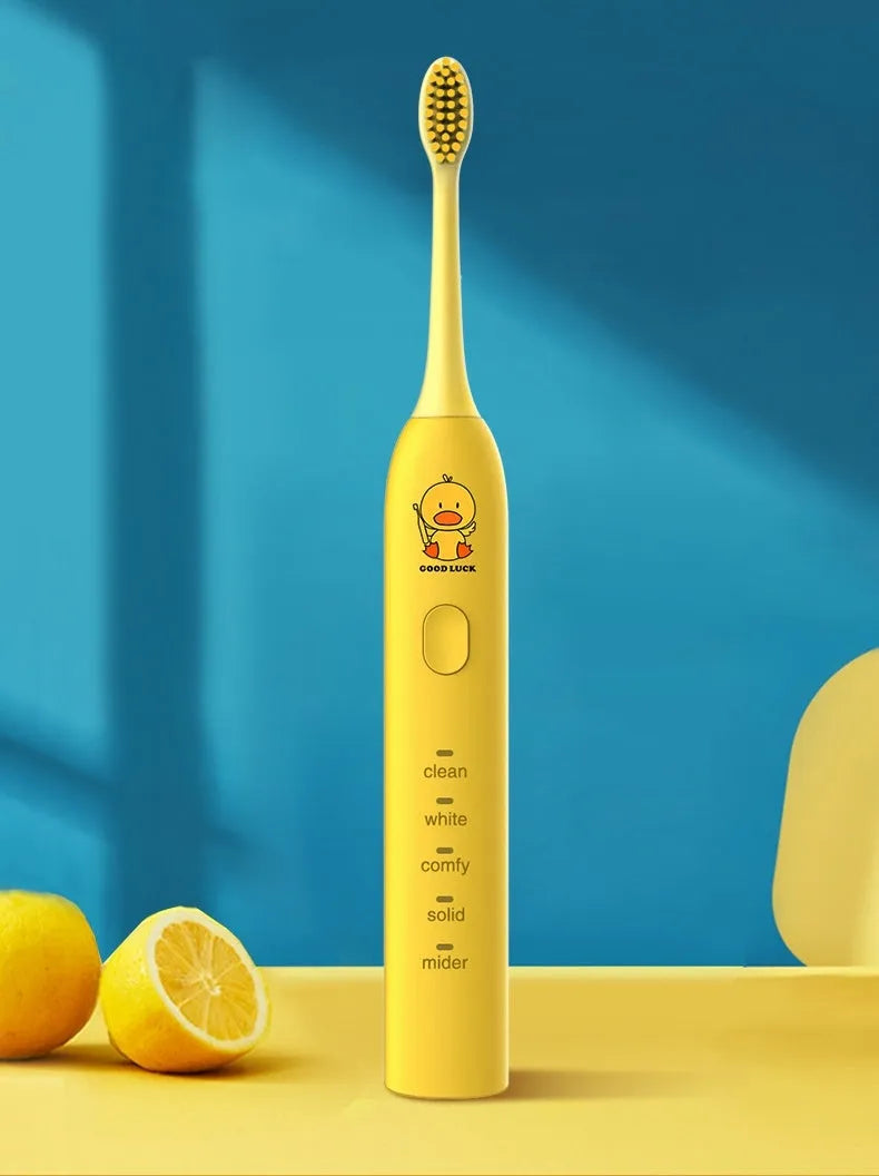 Small yellow duck USB rechargeable electric toothbrush with soft bristles and laser engraved shell