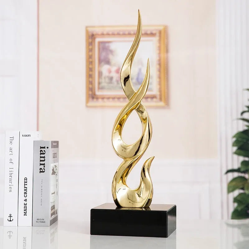Modern resin festival decoration in bright gold metallic finish with half-handmade construction