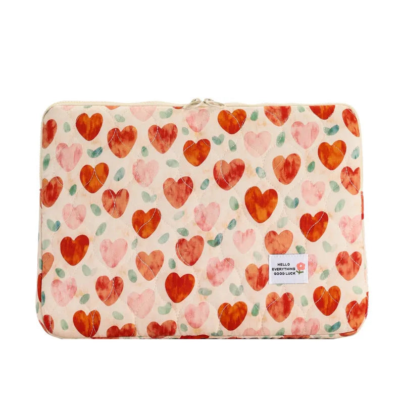 Printed floral design cloth laptop bag for women shown in small, medium, and large sizes.