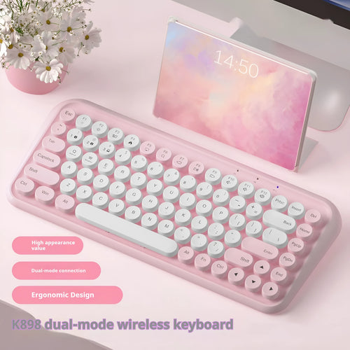 Pink Bluetooth wireless keyboard with 84 keys showing compact design