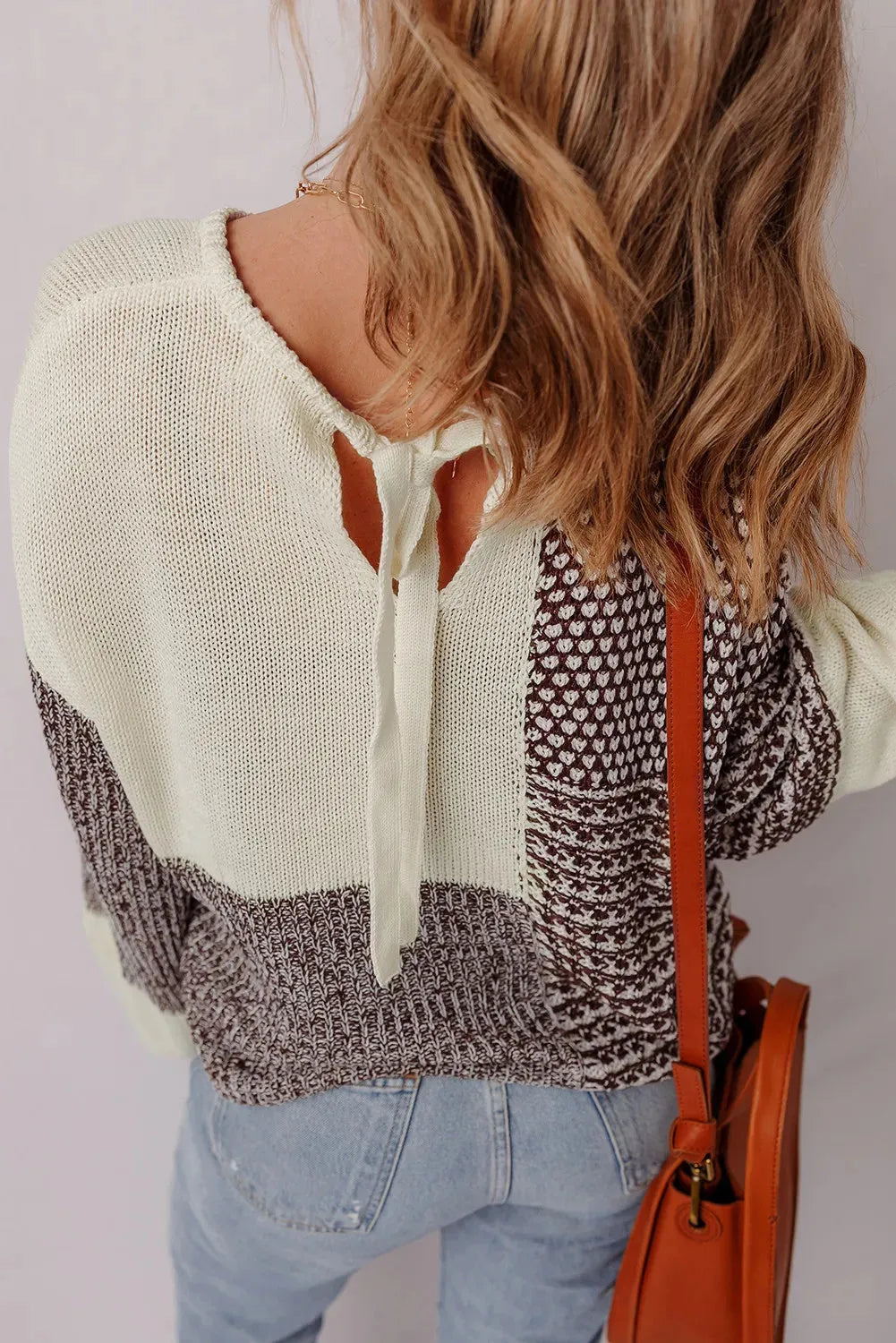 Dark khaki colour block loose knit sweater with drop shoulders and a back tie detail.