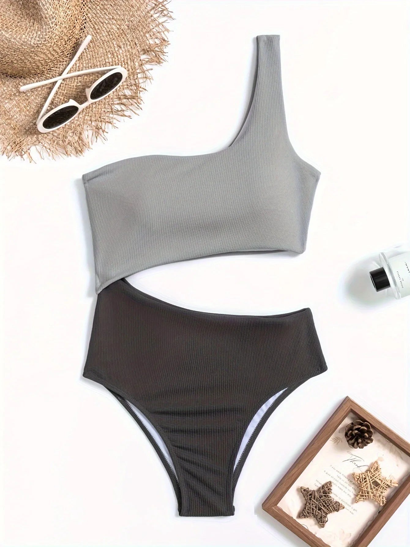 Women's solid colour one-piece swimsuit with one-shoulder design in light grey