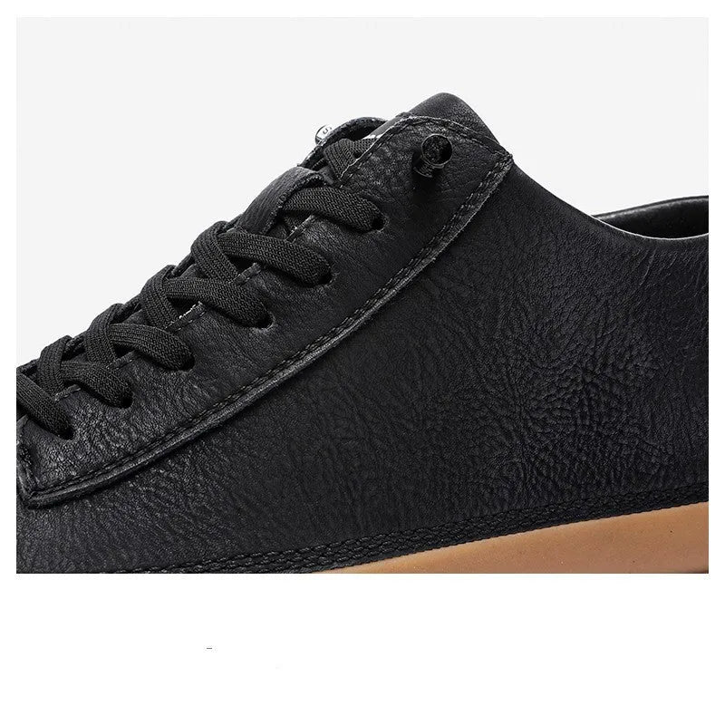Men's black leather casual shoes with round toe and lace-up closure on rubber sole