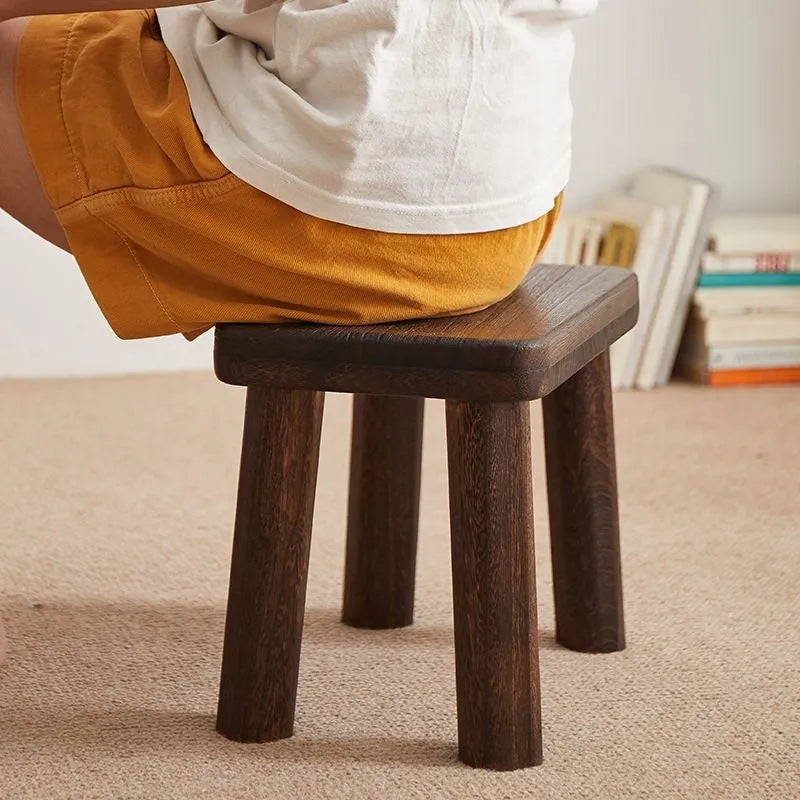 Distressed finish solid wood shoe changing stool with bracket structure for household use