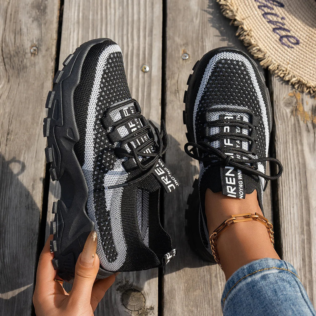 Women's Flyknit mesh lace-up running sneakers in multiple colour options with rubber sole