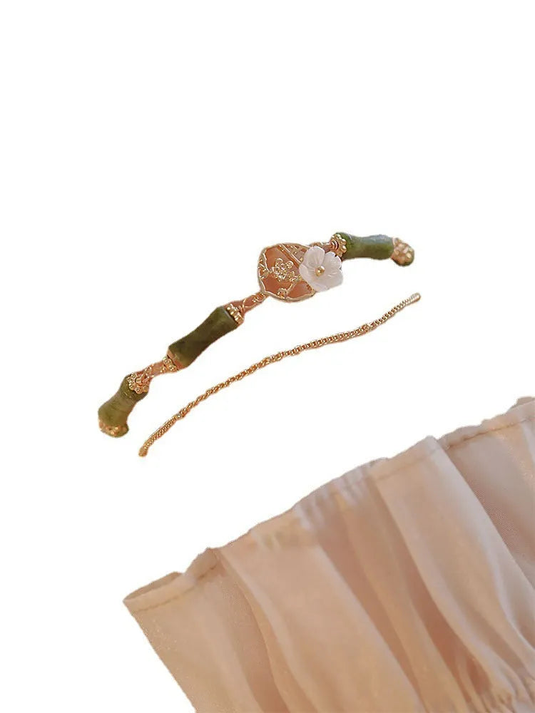 Natural green Olivine double layer bracelet with Twin Bells of Ireland and Olive Branch charms.