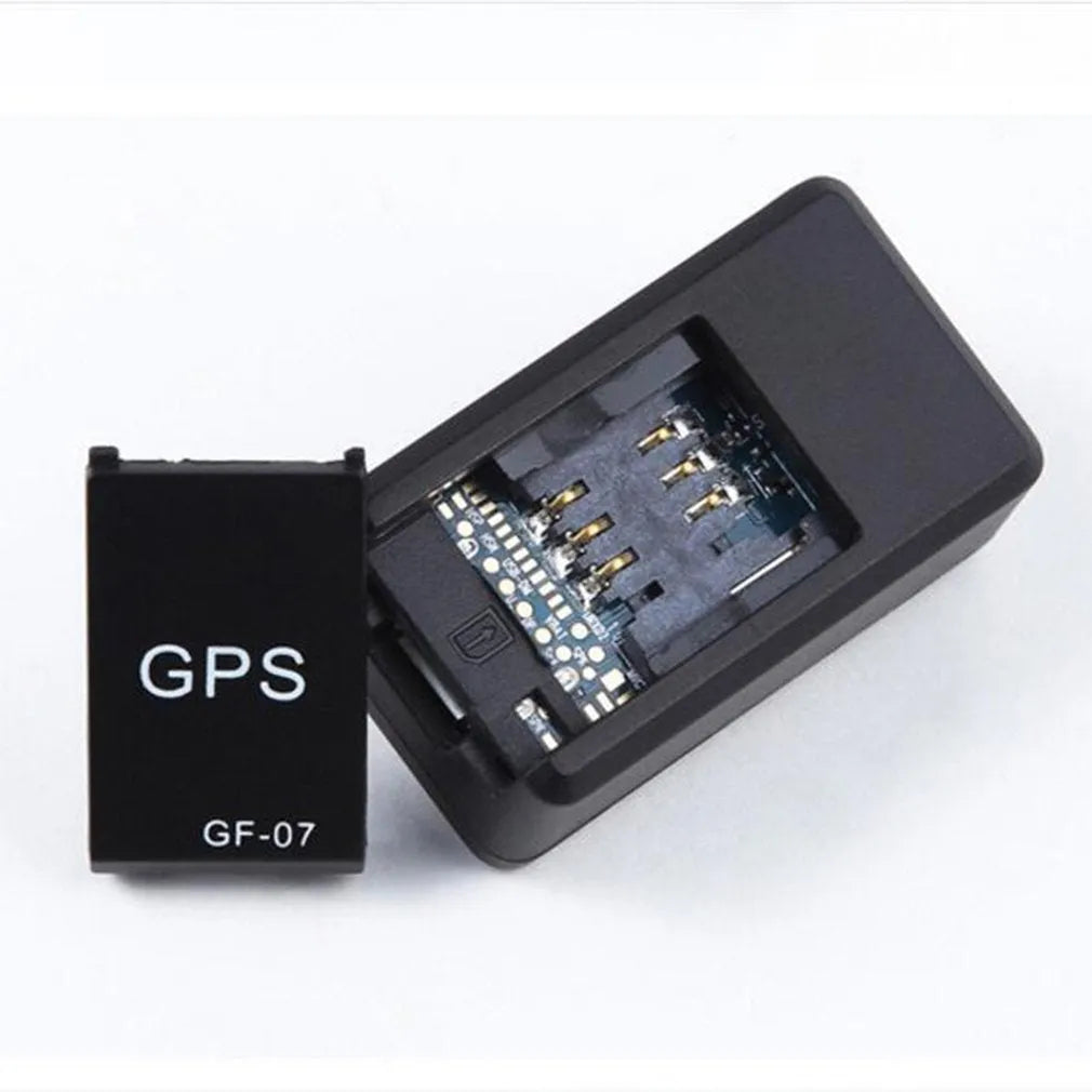 Black magnetic GPS tracker device measuring 35x20x14mm with USB charging cable for vehicle and personal tracking