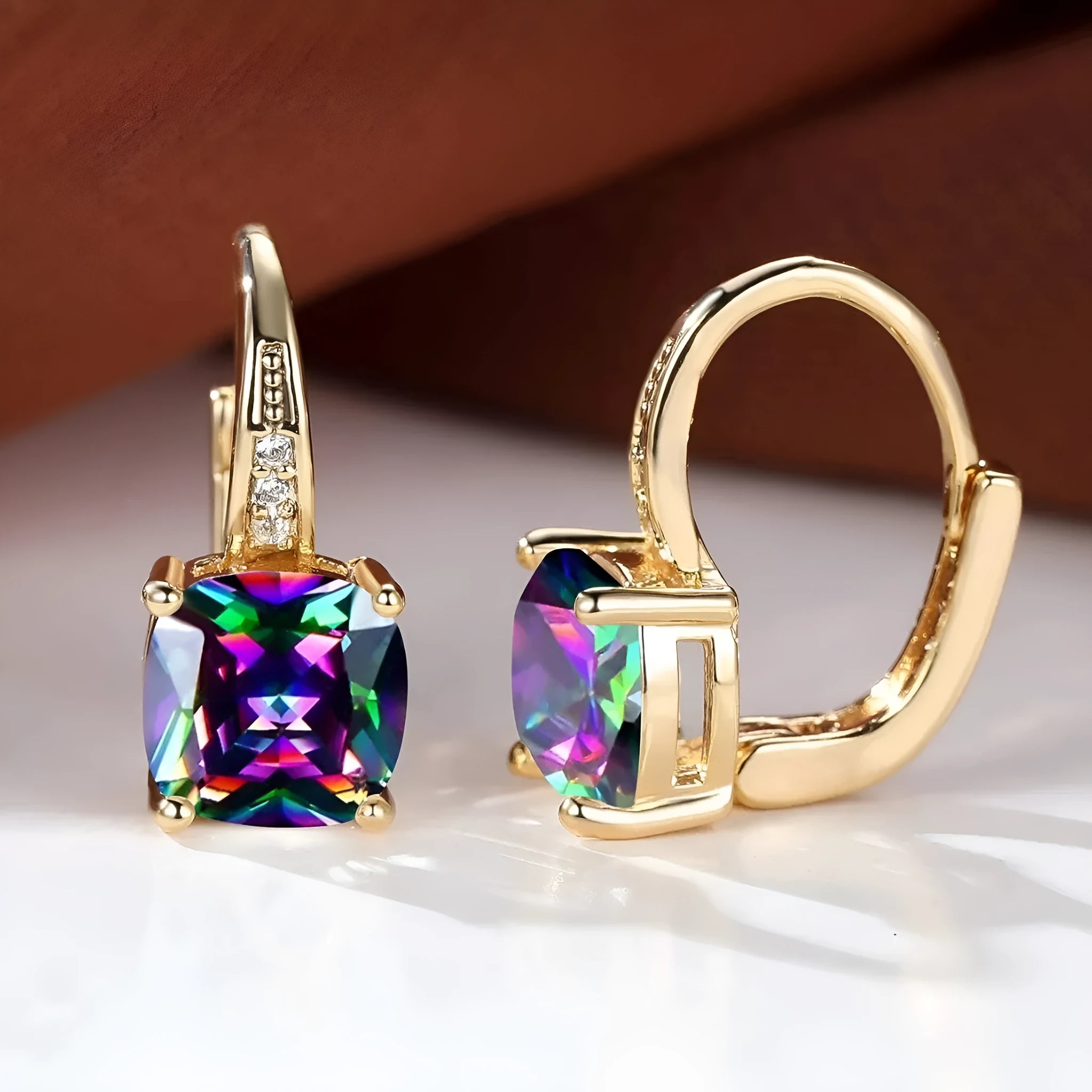 Square geometric copper ear clip with colourful moissanite inlays and electroplated gold finish