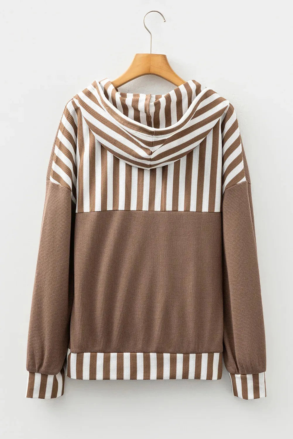 Straw yellow waffle texture hoodie with patchwork stripes, drawstring hood, and button neck detail