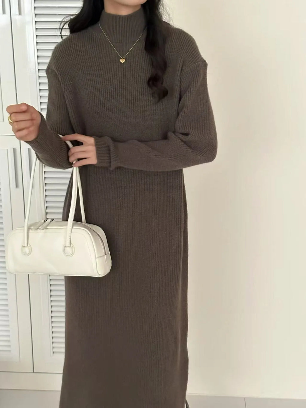 Women's half turtleneck knitted dress in acrylic fabric with high waist and midi length