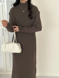 Women's half turtleneck knitted dress in acrylic fabric with high waist and midi length