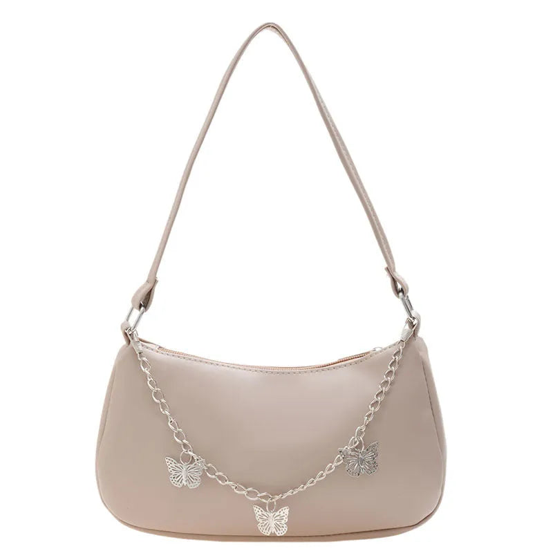 Butterfly chain underarm bag in horizontal square shape with detachable strap and organised interior