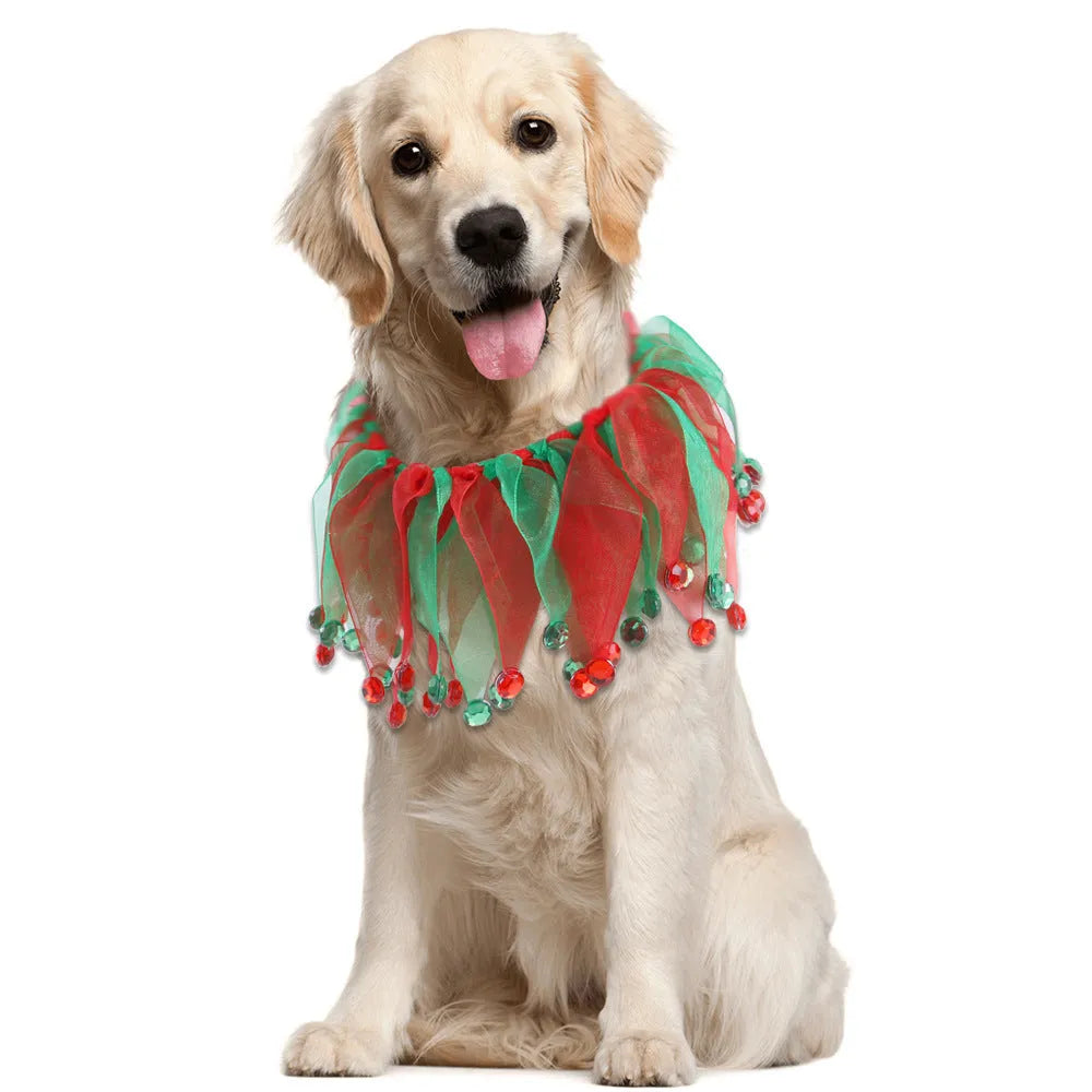 Colourful tie-dye cloth dog collar showing Christmas and Halloween patterns alongside green and blue solid colours.