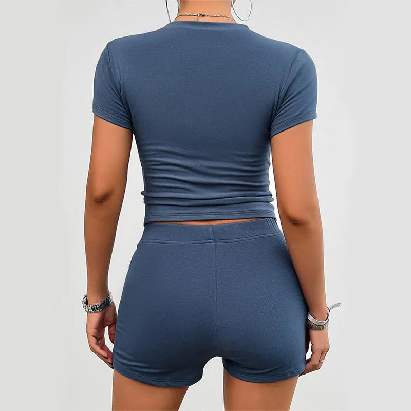 Women's solid colour viscose sports suit with short sleeve t-shirt and elastic shorts in four colour options
