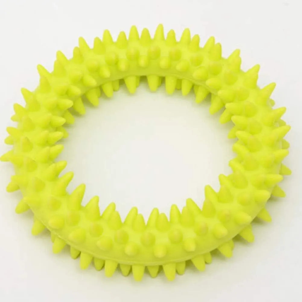 Blue TPR spiky circle ring dog chew toy for dental cleaning on a white background.