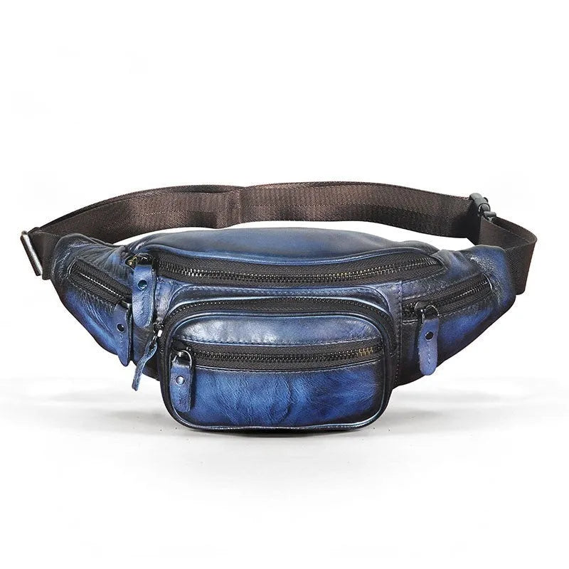 Brown cowhide leather messenger bag with a single shoulder strap, shown closed.