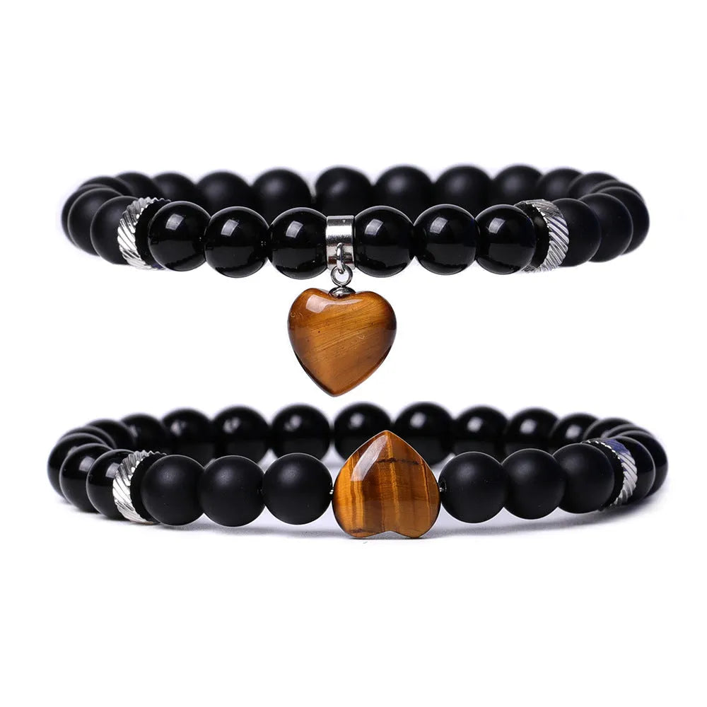Polished natural stone couple heart bracelets in obsidian, agate, tigereye, crystal, aventurine, topaz, opal colours.