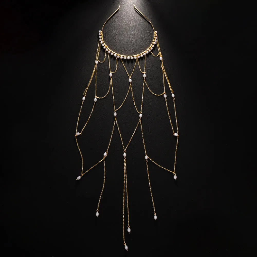 Women's decorative hair chain with pearl bead and tassel in gold or silver electroplated finish.