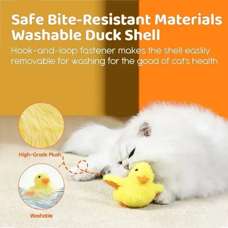 Yellow flapping duck cat plush toy with vibration sensor and USB charging cable on a neutral background.