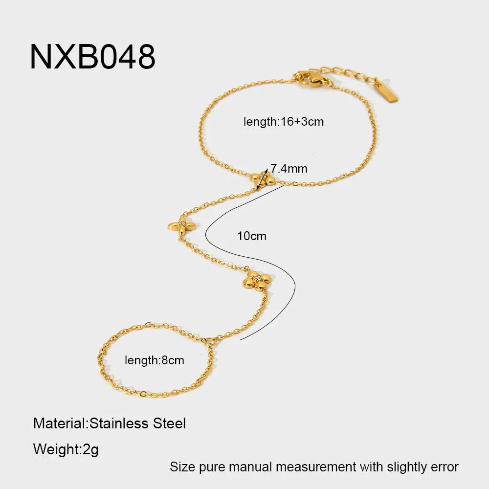 Women's gold stainless steel bracelet with geometric flower and eight-pointed star design
