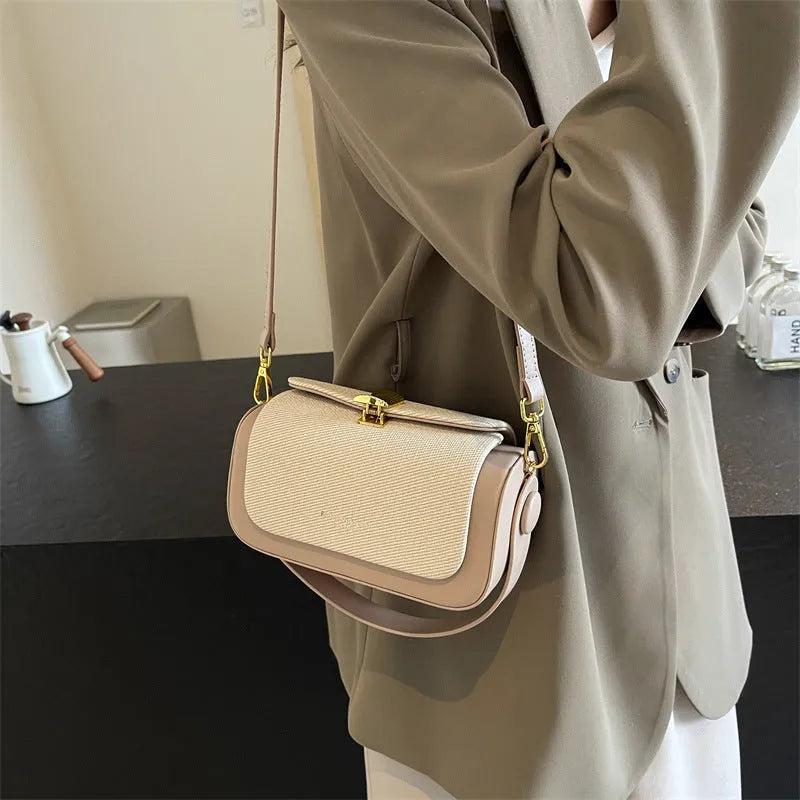 Women's PU leather crossbody messenger bag in a horizontal square shape with a single strap.