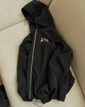 Men's loose fit grey hooded sunscreen jacket showing front view with polyester fabric texture detail