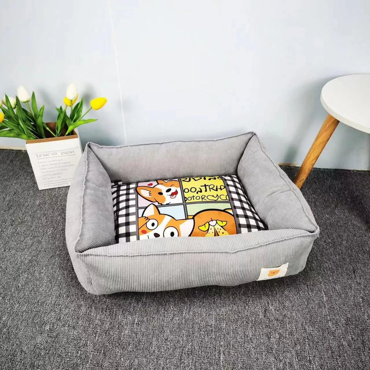 Rectangular cloth pet nest for dogs and cats in a choice of colours, shown in two available sizes.