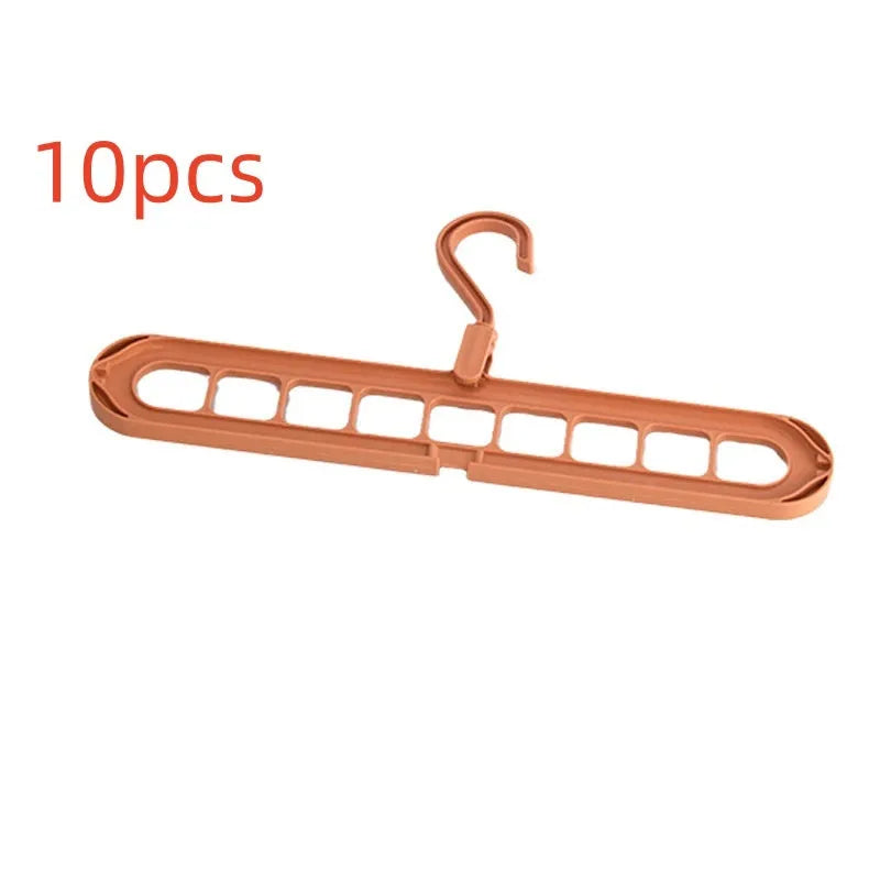 Plastic nine-hole folding trouser hanger in beige, blue, grey, green, or pink colour