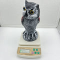 Realistic plastic artificial owl bird deterrent ornament with shaking head, for outdoor use.