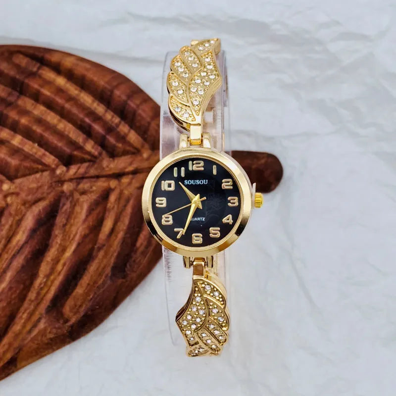 Women's stainless steel watch with round dial and Vachette clasp, shown in gold colour option.