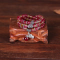 Natural watermelon crystal bracelet with Chinese knot and geometric elephant-style beads