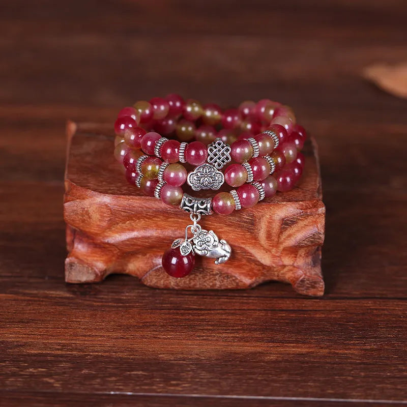 Natural watermelon crystal bracelet with Chinese knot and geometric elephant-style beads