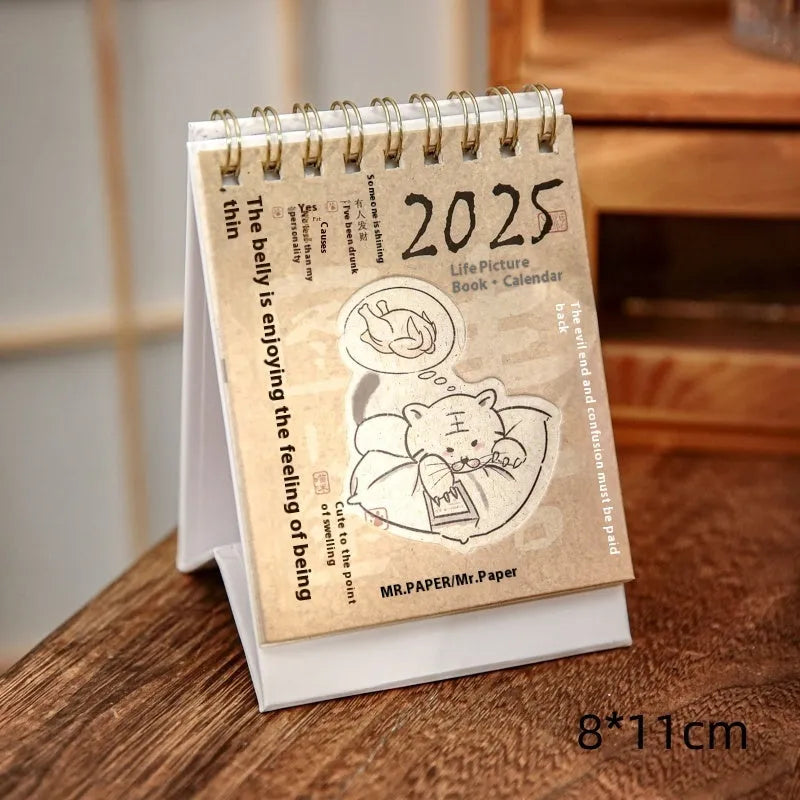Mini 2025 desk calendar showing multiple design options including Coffee Time and Life Is Not Easy themes