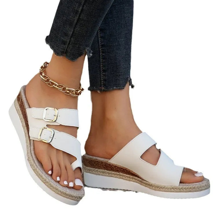 White patent leather wedge sandals with finger-fit design and woven detailing