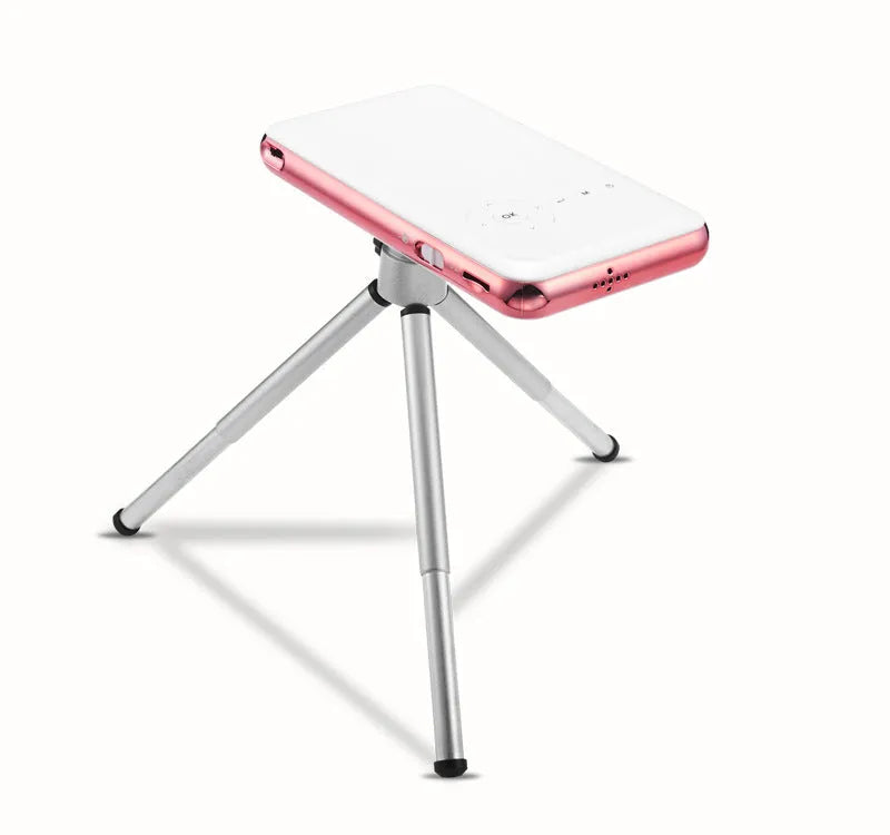White rose gold miniature DLP projector measuring 145mm with Android connectivity and 32GB memory