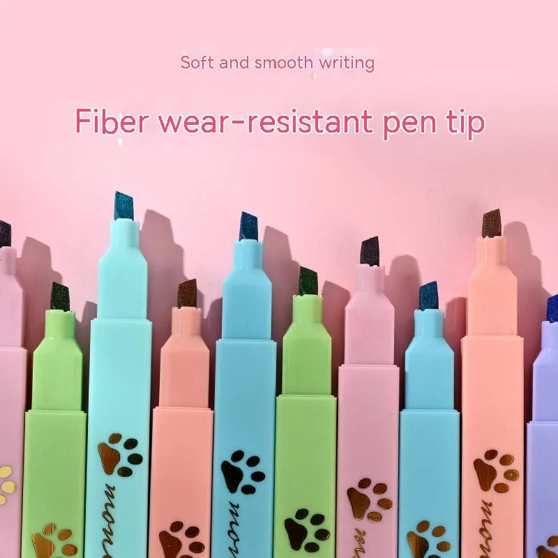 Cat's Paw fluorescent marking pen set showing six coloured pens with oblique nibs in a plastic case.