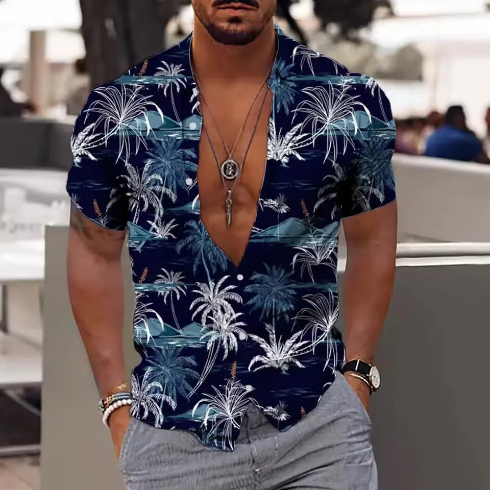 Man wearing a loose-fitting short sleeve shirt with a colourful floral pattern, cardigan style.