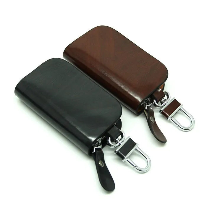 Genuine leather car key case in frosted black or brown with zipper closure