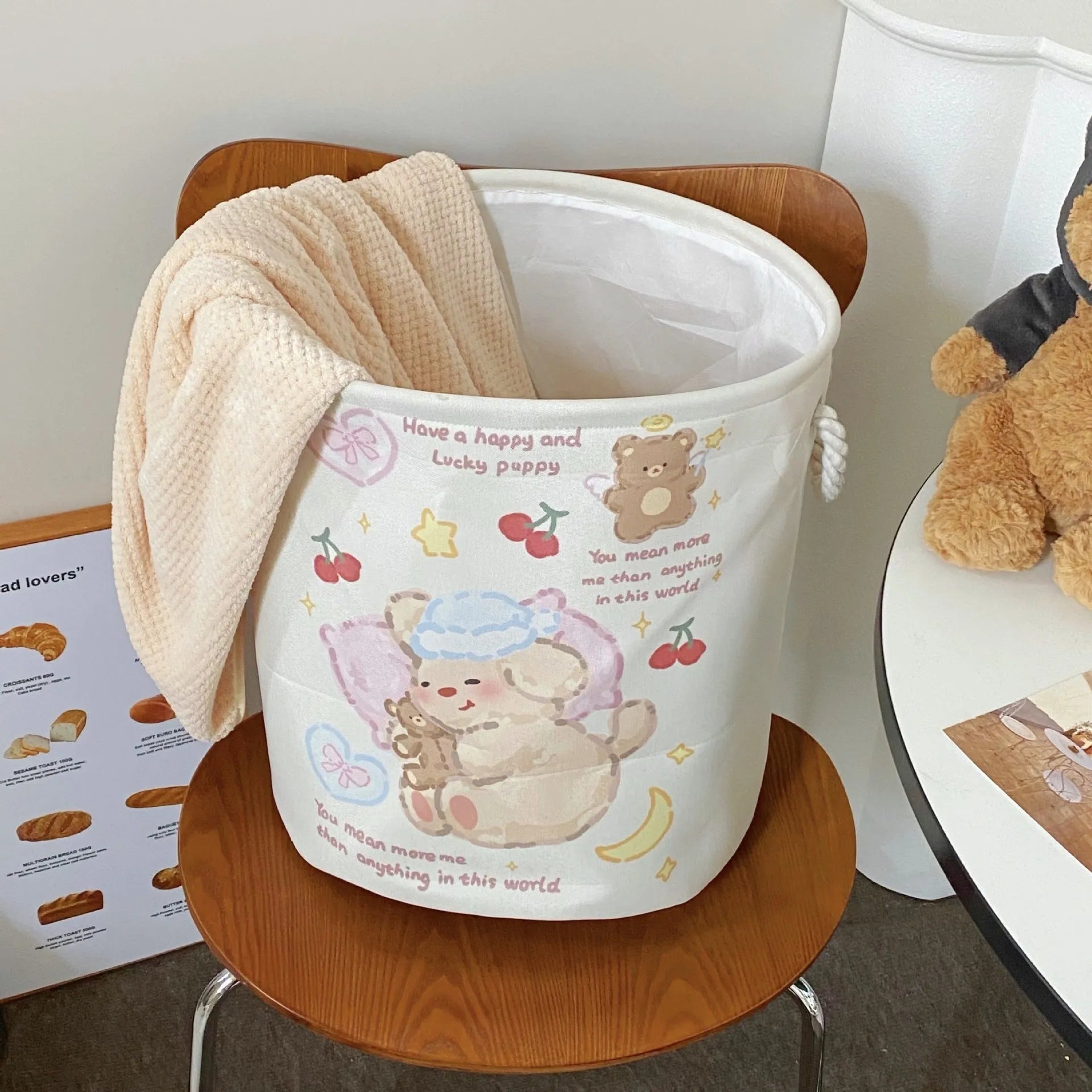 Foldable cotton laundry basket with modern design and pattern options for bedroom storage