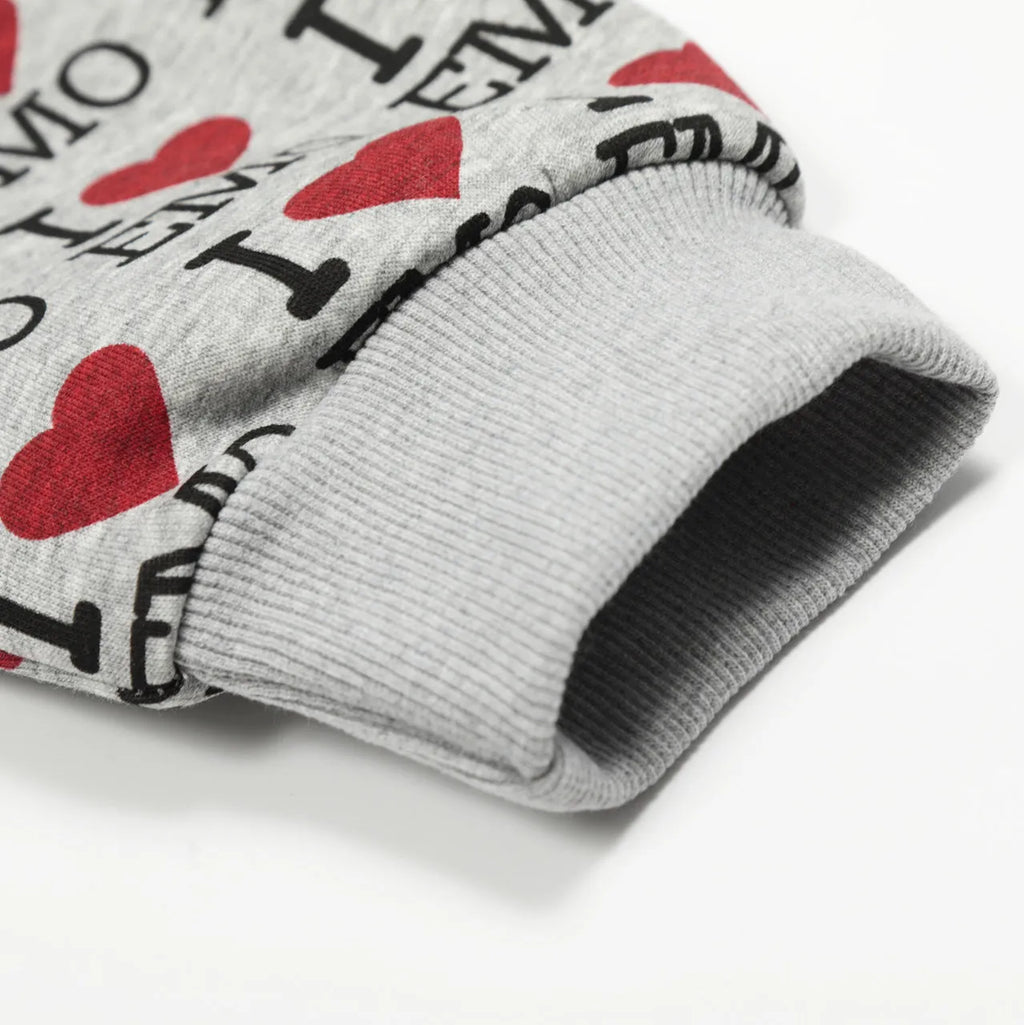 Women's melange grey cotton hooded cardigan with retro autumn pattern showing long sleeves and street fashion styling