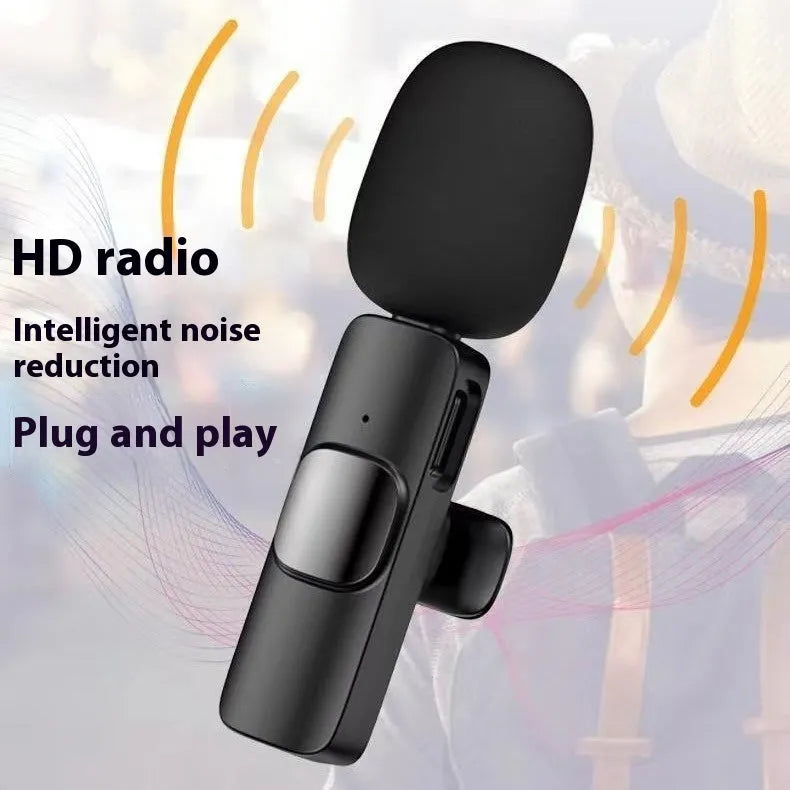 Wireless lapel microphone with clothing clip for smartphone video recording.